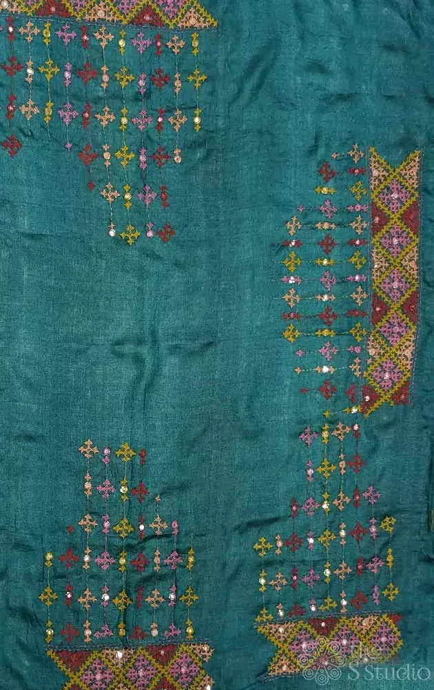 Dark green tussar silk material featuring mirror work kutch hand embroidery