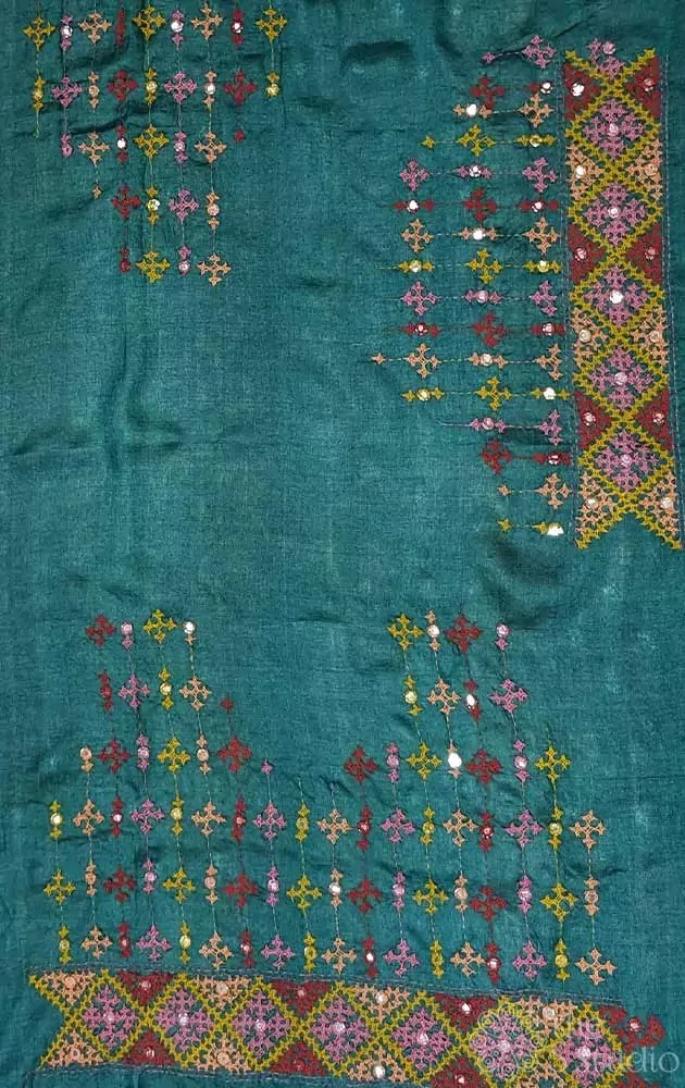 Dark green tussar silk material featuring mirror work kutch hand embroidery