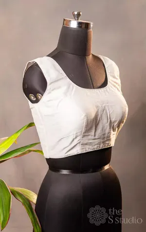 White sleeveless cotton readymade blouse