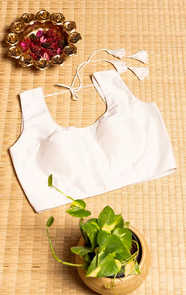 White sleeveless cotton readymade blouse