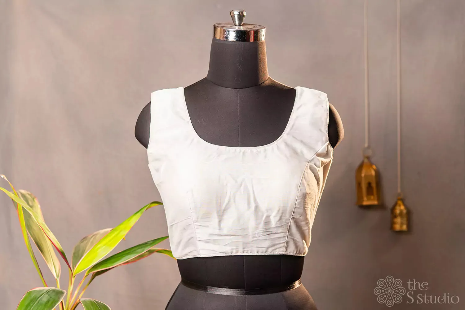 White sleeveless cotton readymade blouse